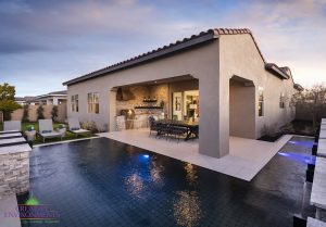 Creative Environment design and landscape in Scottsdale showing backyard with floating patio area surrounded by zero edge pool