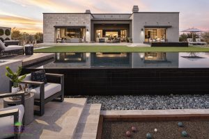 Creative Environments design and landscape at Sereno Canyon Mayne Model showing zero edge swimming pool over seating area