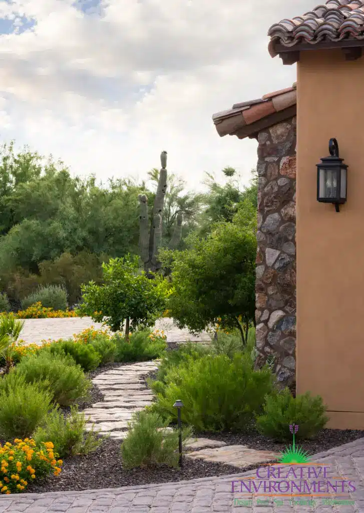 Front yard design with natural stone steps and greenery pathway