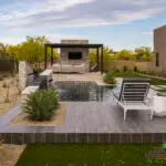 Custom backyard landscape design with organized planting, slatted shade structure and pool.