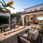 Custom backyard design with living wall, outdoor TV and deco-tile linear fire pit.