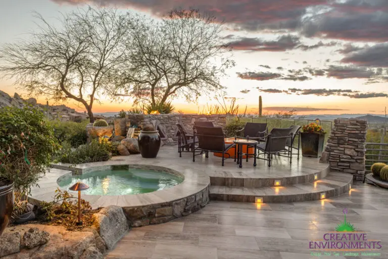 Backyard design with multiple seating areas and contemporary desert vibes.