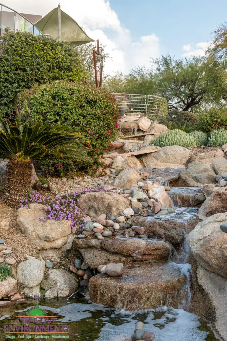 Backyard design with natural stone water fall.