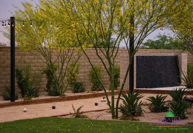 Custom black water wall and bocce ball court