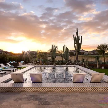 Custom backyard design with deco-tile pool and water bubblers.