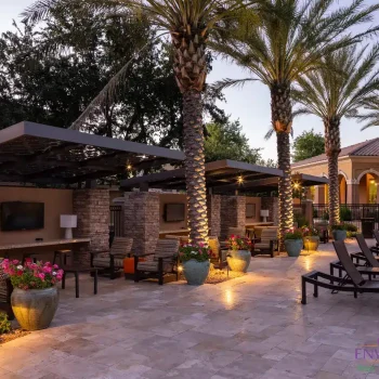 Custom community amenities with cantilevered shade structures, large planters and multiple outdoor seating areas.