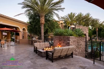 Custom community amenities with fire pit, metal pool fencing and multiple outdoor seating areas.
