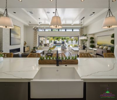 Custom backyard design with seamless indoor/outdoor design fusion.