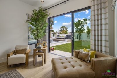 Custom backyard design with seamless indoor/outdoor design fusion.