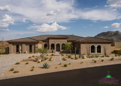 Custom front yard design with desert landscaping, natural stone paver driveway and cacti.