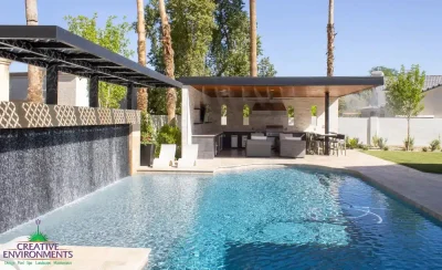 Backyard design with misters, outdoor kitchen and pool.
