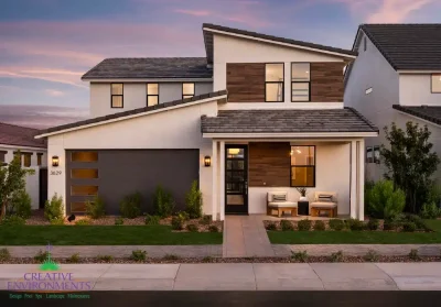 Front yard design with real grass and organized planting.