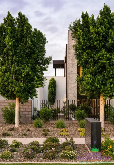 Custom front yard design with trees and organized planting.
