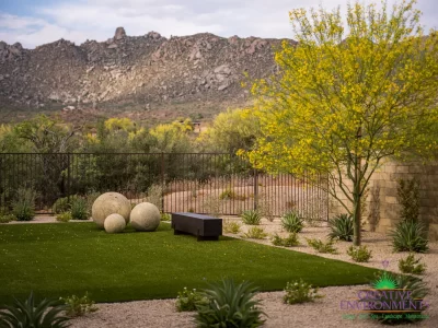 Custom backyard design with artificial turf, organized planting and artificial turf.