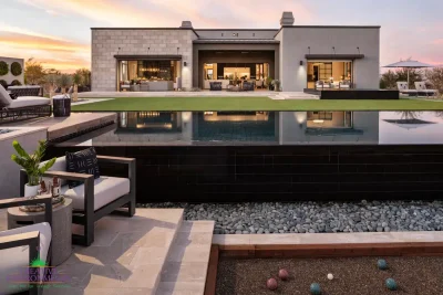 Custom backyard design with bocce ball court, pool and artificial turf