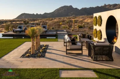 Custom backyard design with natural stone steps and circular living wall and fire feature.