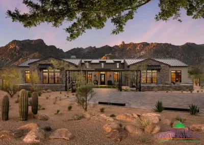 Front yard design with paver driveway and desert plants.