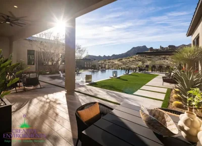 Backyard design with natural stone steps, pool and outdoor fan.