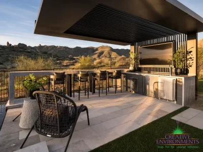 Backyard design with cantilevered shade structure and multiple seating areas.