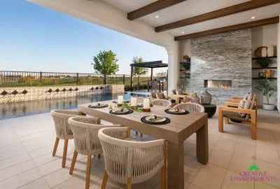 Custom backyard design with marble fireplace, multiple seating areas and Spanish style pool.