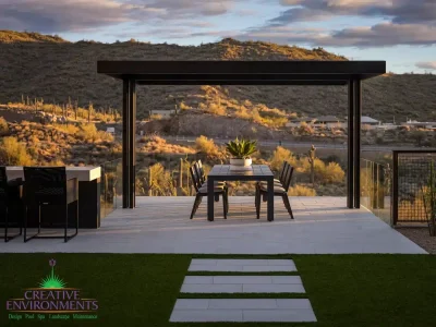 Custom backyard design with metal sahde structure ad outdoor dining area