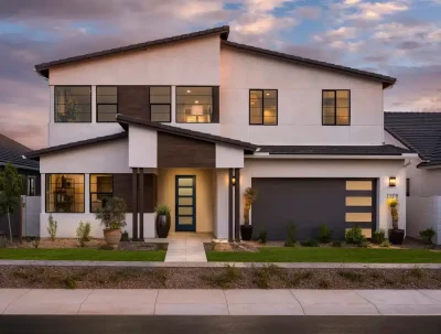 Custom front yard design with desert plants and artificial turf.