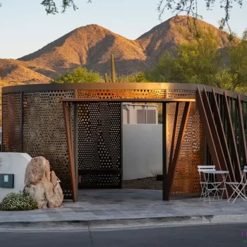 Custom community entranceway with unique metal shade structure that doubles as a metal statement piece.