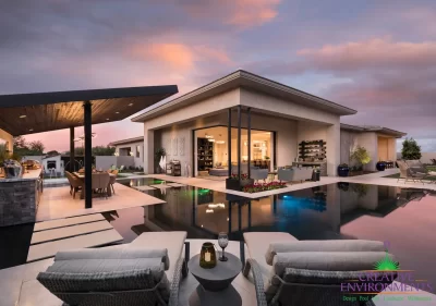 Custom backyard design with angled shade structure, zero-edge pool and Jesus steps.