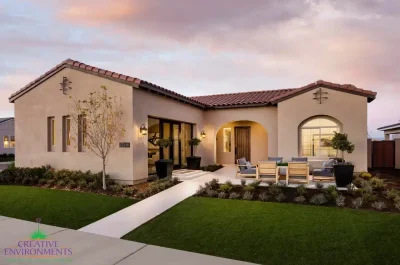 Custom front yard design with seating area, artificial turf and organized planting.