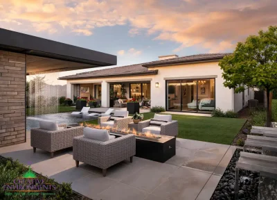 Custom backyard design with linear fire pit, black beach pebbles and multiple seating areas.