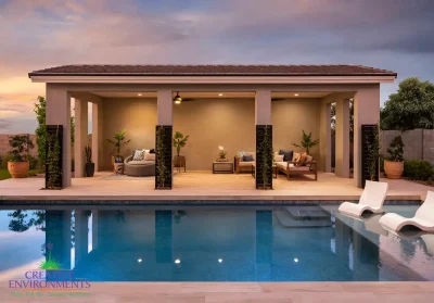 Custom backyard design with cabana, baja step and blue pool.