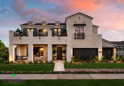 Custom front yard design with real grass, organized planting and up lighting.