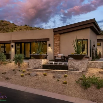Custom front yard design with water fountain, wok planters and desert contemporary vibes.