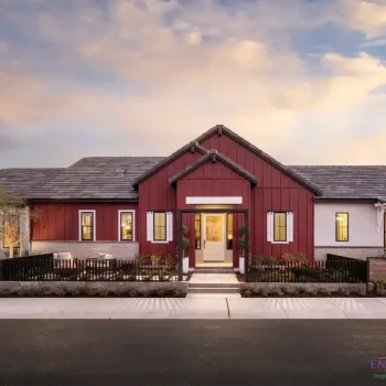 Custom front yard design with farmhouse design, metal fencing and metal archway.