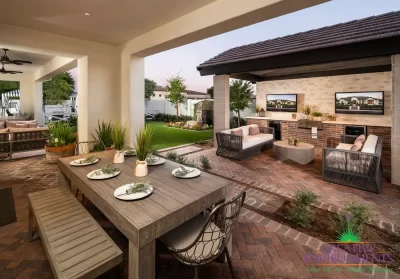 Custom backyard design with multiple outdoor seating areas, artificial turf and organized planting.