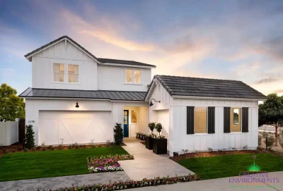 Front yard design with real grass, organized planting and metal planters.