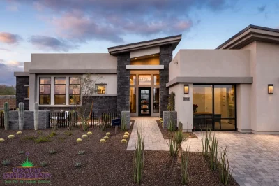 Custom front yard design with organized planting, brick paver walkway and desert contemporary vibes.